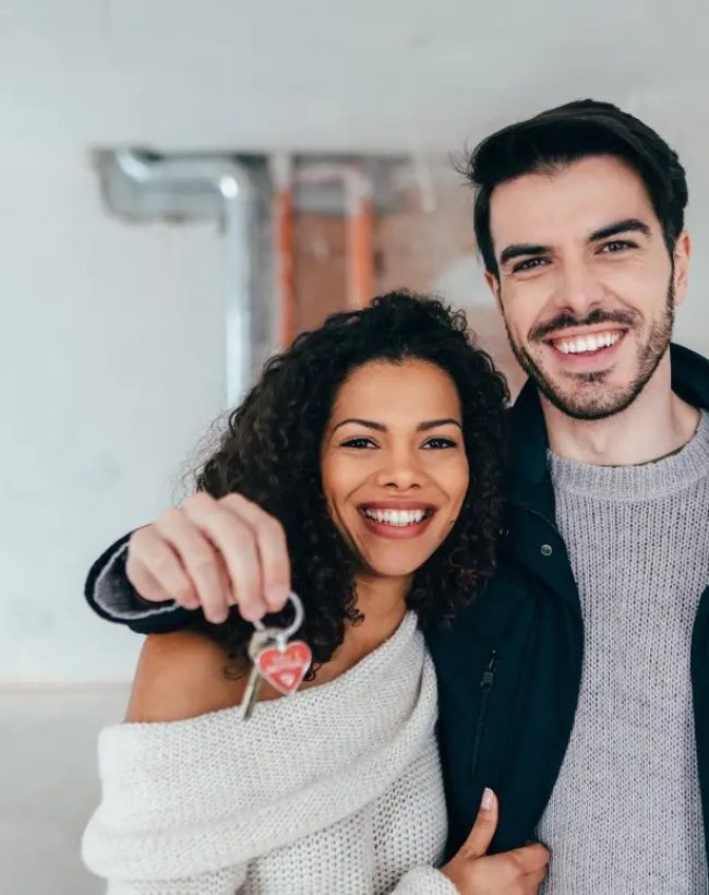 a family or couple getting approved for a home loan