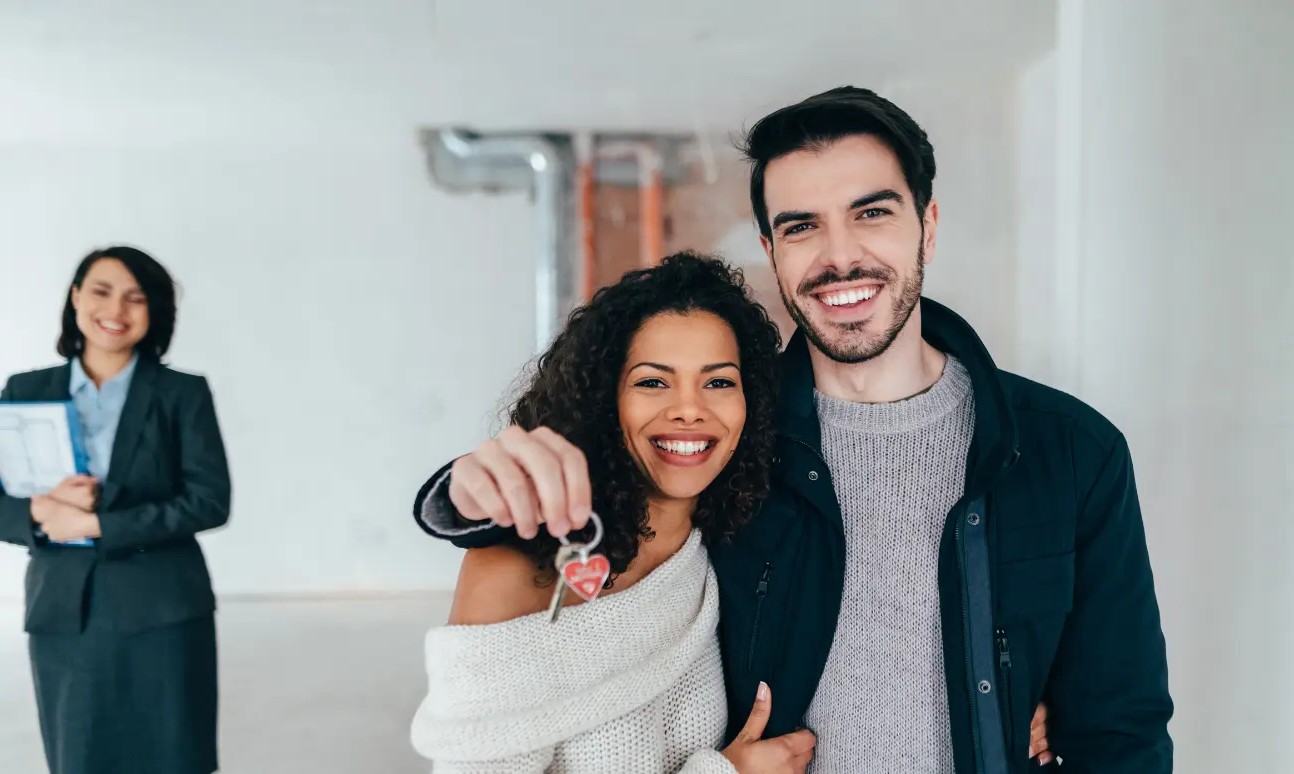 a family or couple getting approved for a home loan