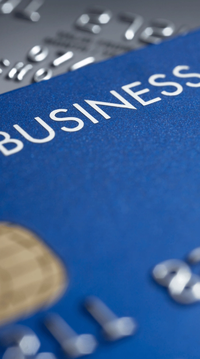 A close-up view of a blue card featuring the word BUSINESS, representing business tradelines for sale.